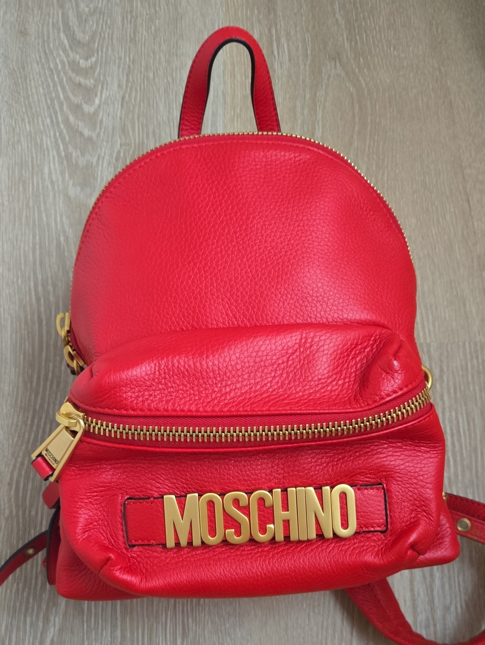 Moschino Red Pebbled Leather Mini Backpack with Gold Logo